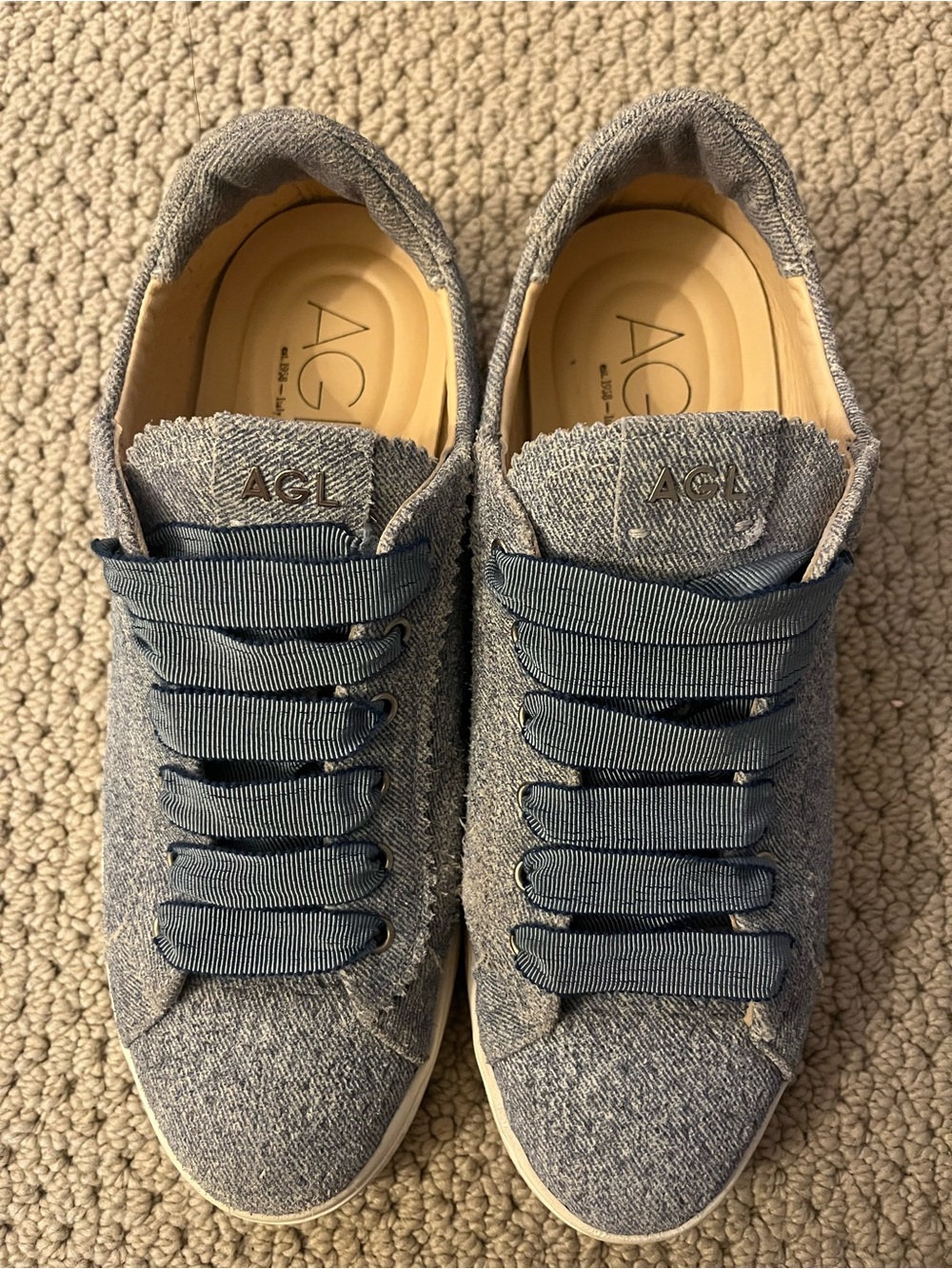 AGL Denim-Textured Ribbon Lace Slip-Ons in Blue
